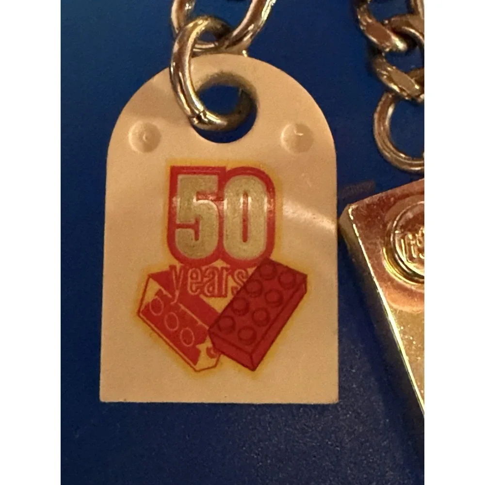NEW Lego 50 years Anniversary Gold Brick Keychain - ‎ 2008 (852445)